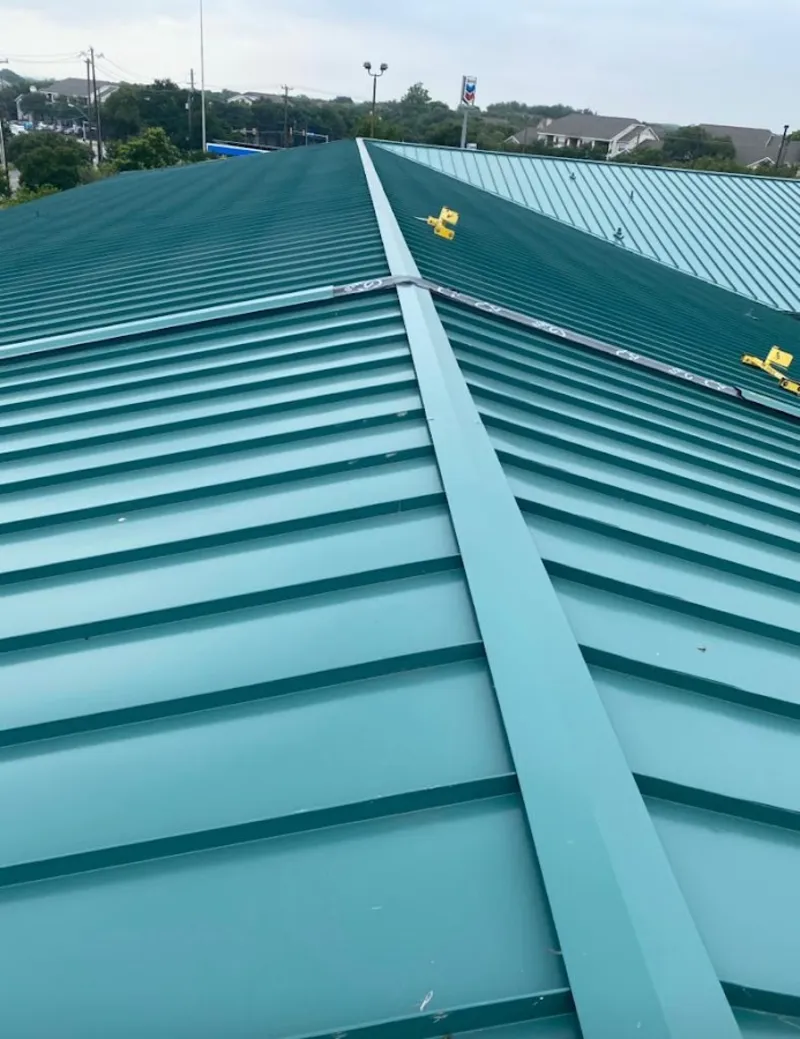 Green commercial metal roof ridge and valley for Metal Roof Repair in Ghent